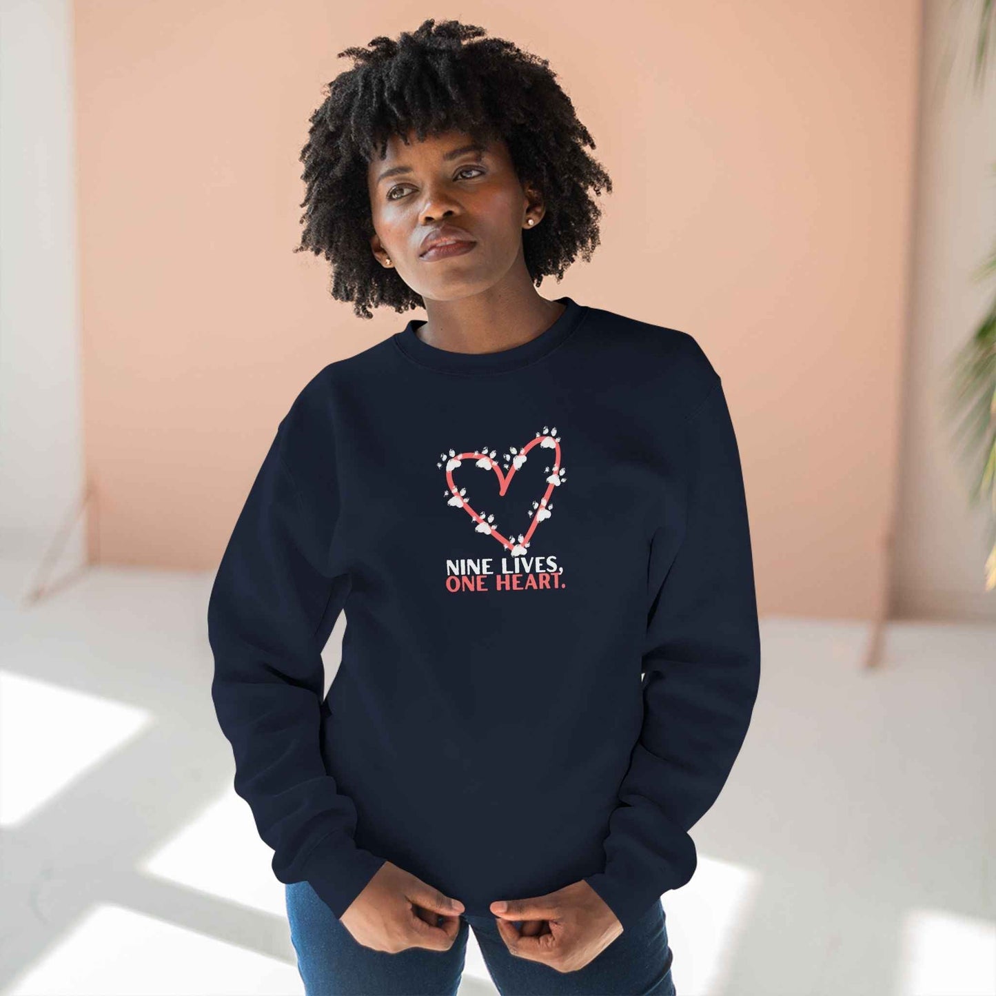 Nine Lives, One Heart β Cat Lover Sweatshirt