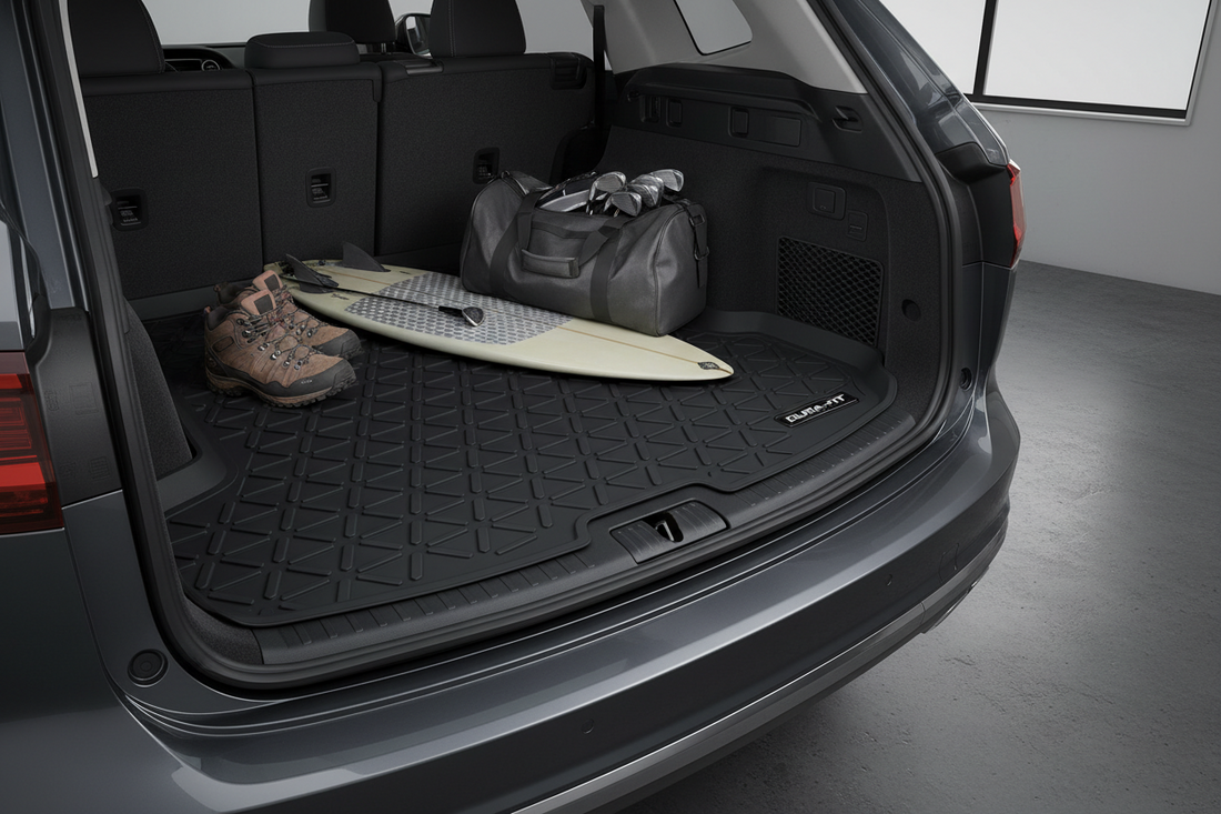 Custom-fit rubber cargo liner protecting SUV trunk from spills and mud