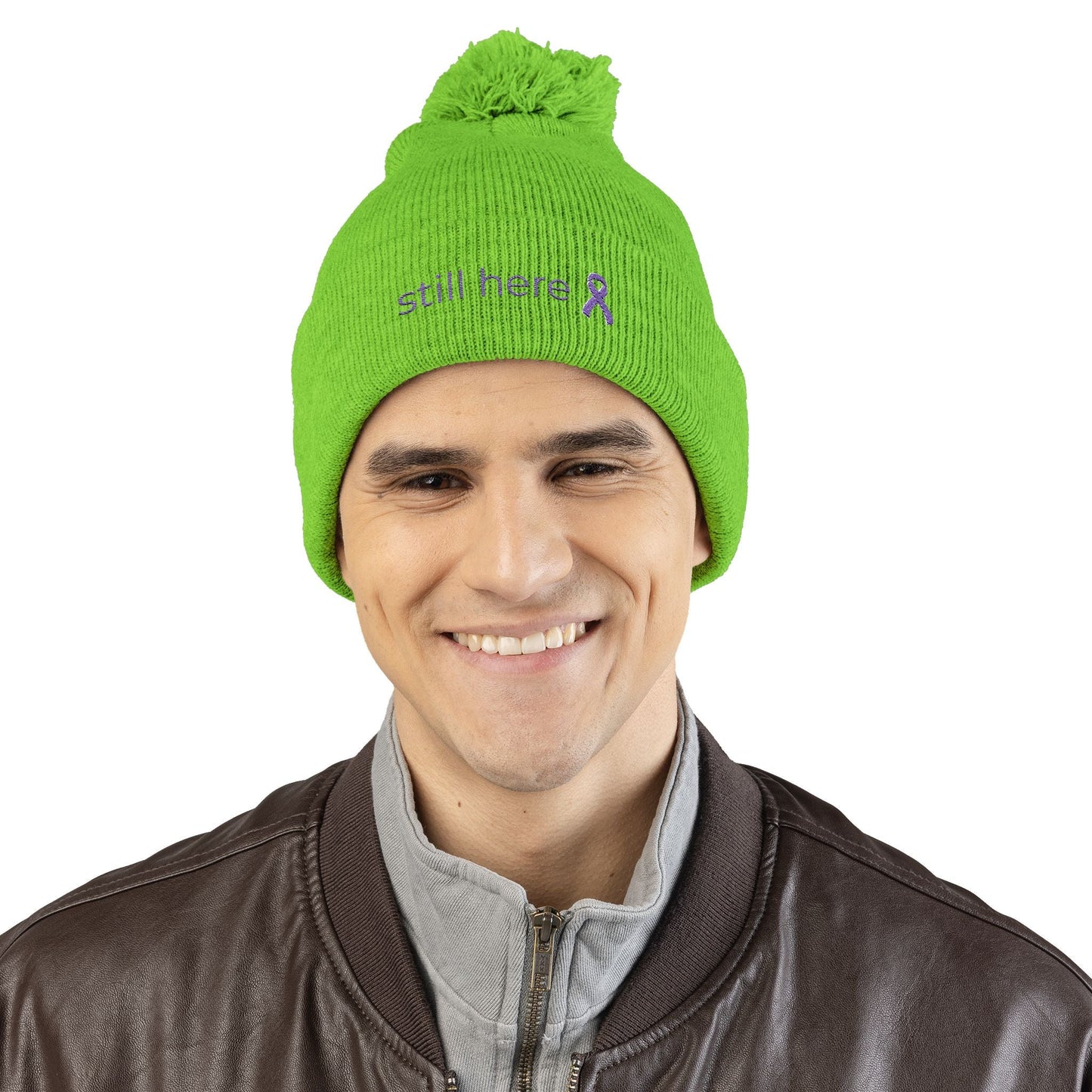 Still Here Pom-Pom Beanie – Epilepsy Awareness Knit Hat with Purple Ribbon