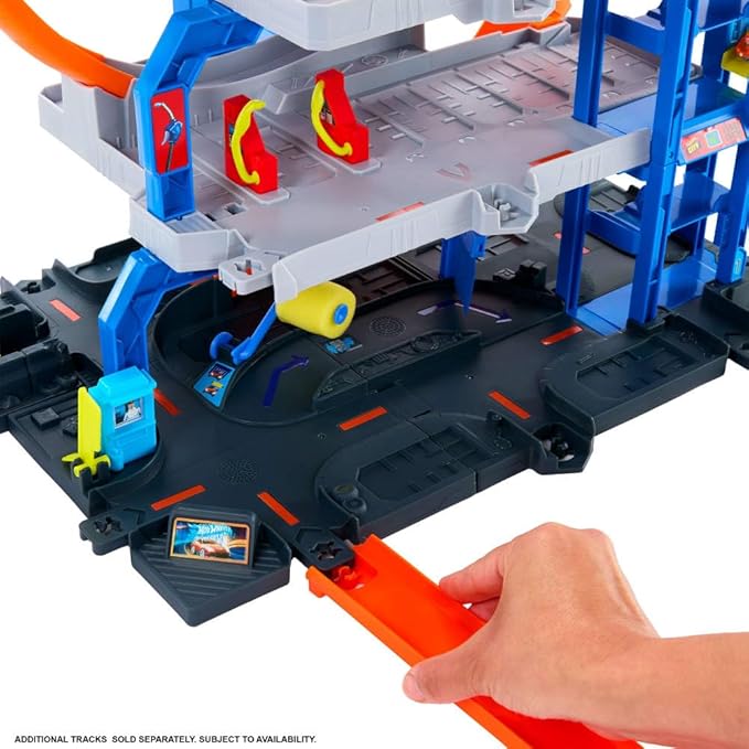 Hot Wheels Toy Car Track Set with Die-Cast Car & Helicopter, 2 Loops, Storage for 36 1:64 Scale Vehicles, Speed Snap Adapters, Mega Loop Garage