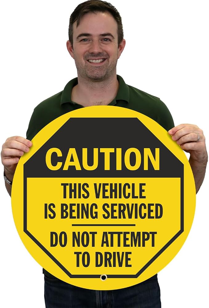 SmartSign Caution - This Vehicle is Being Serviced, Do Not Attempt to Drive Steering Wheel Lock Out Cover | 20" x 20", Made in USA