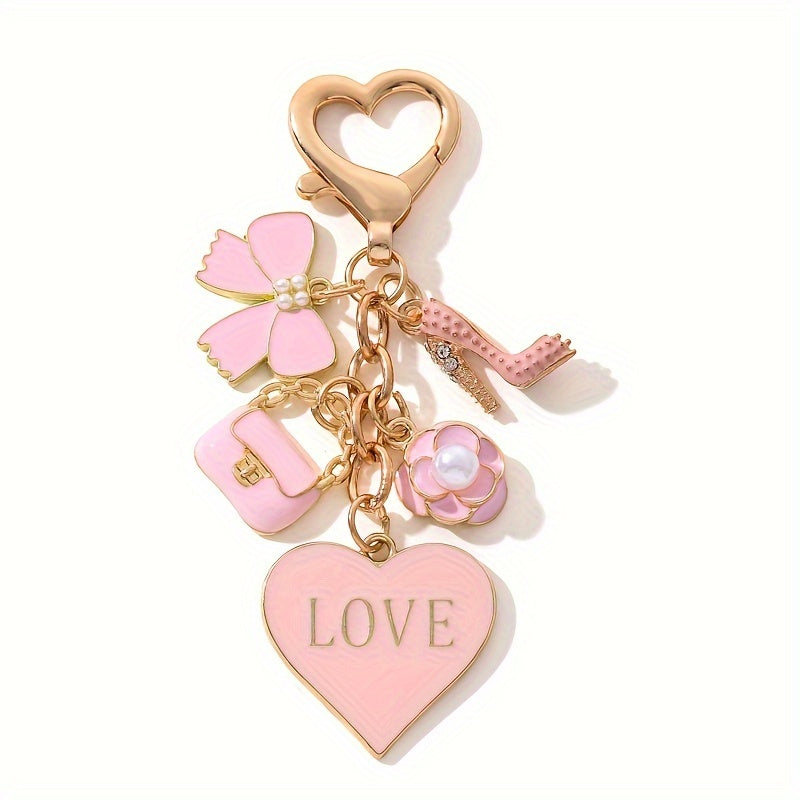 A Cute And Compact Pink Bag with a Heart-Shaped Oil Drop Keychain, Perfect As a Mini Decorative Accessory Or Gift for Cosmetics